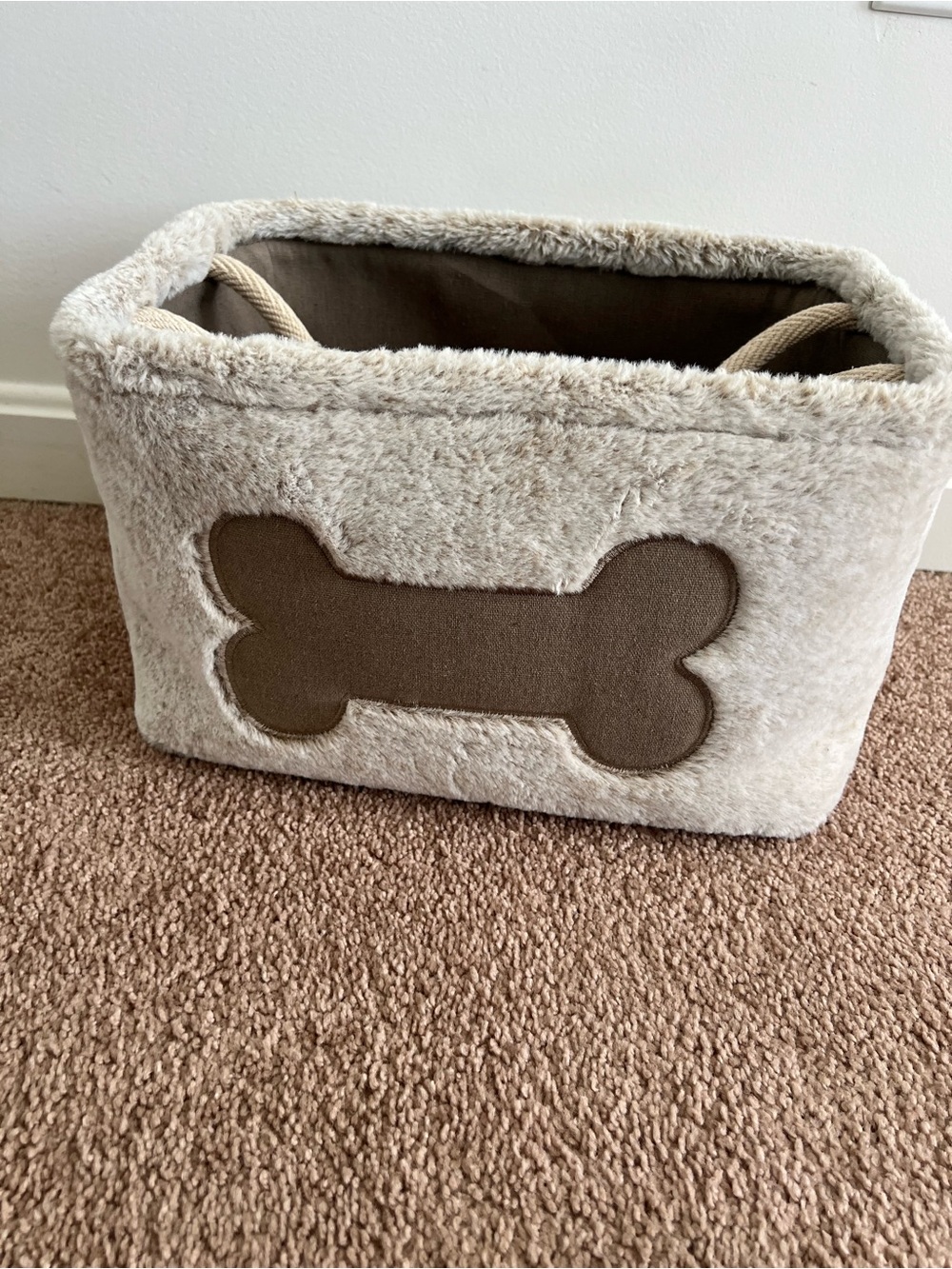 Plush tan Dog Toy Storage Basket with Brown Bone Accent